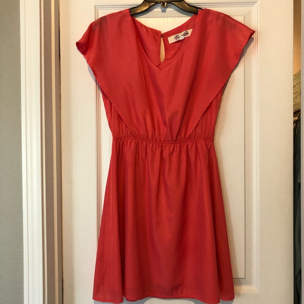 Beautiful coral dress by Emmelee